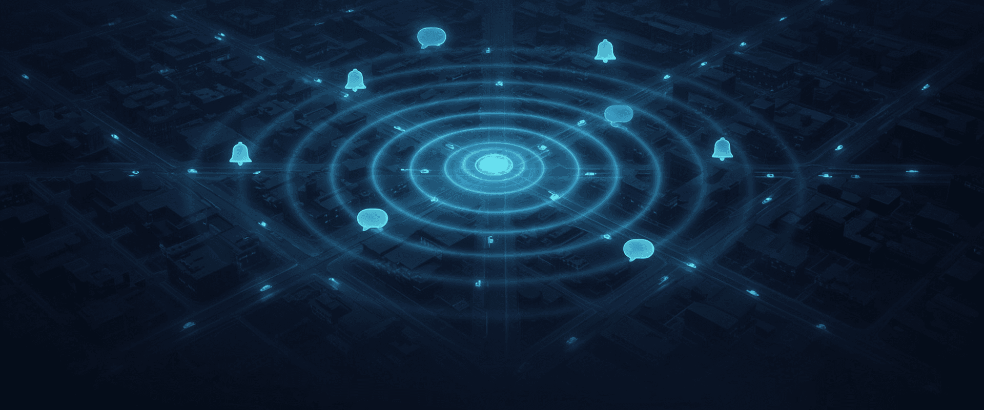 JobBox: aerial night city with pulse rings radiating from a central hub toward field vehicles, with bell and chat glyphs